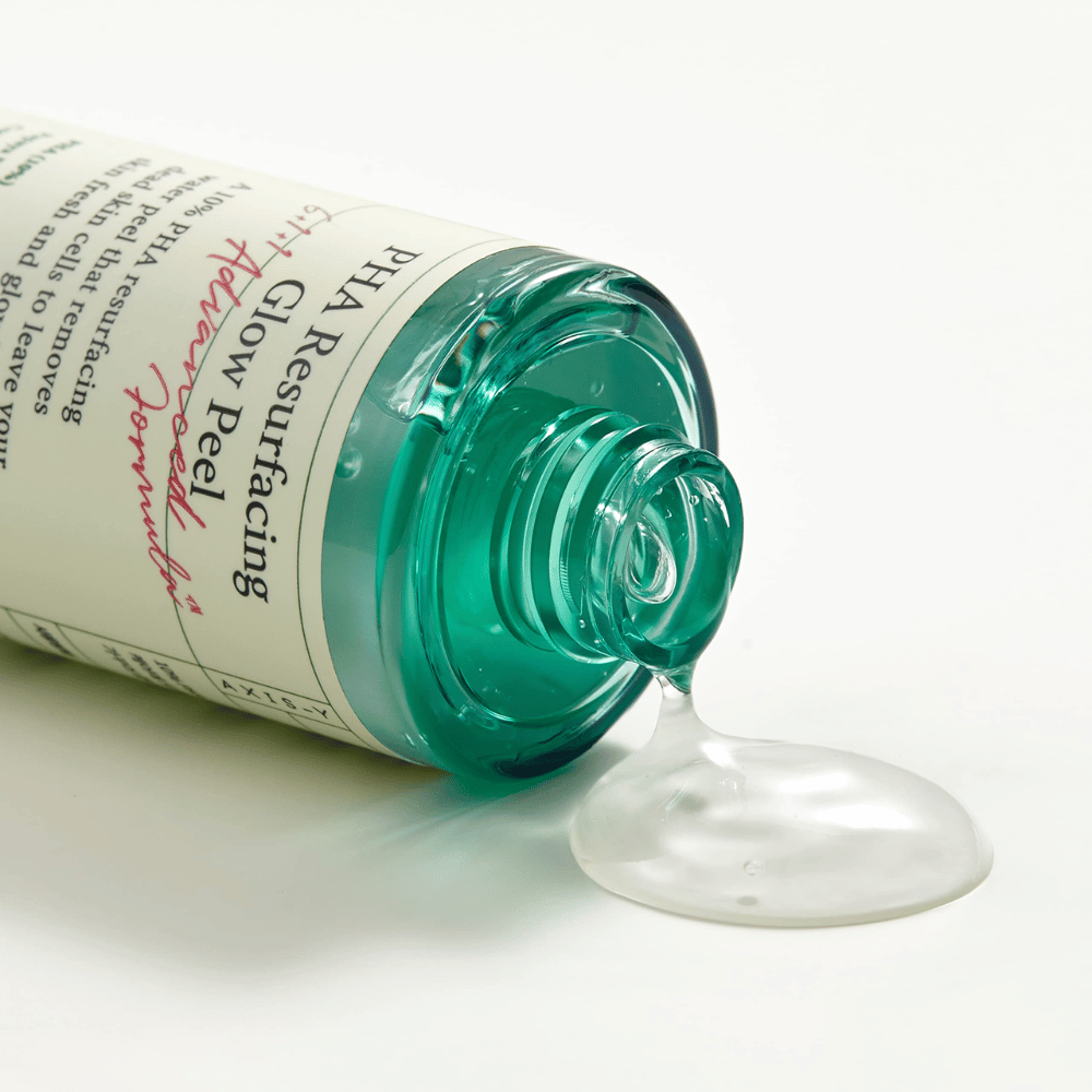 Une bouteille AXIS - Y PHA Resurfacing Glow Peel 50ml sur une surface lisse.