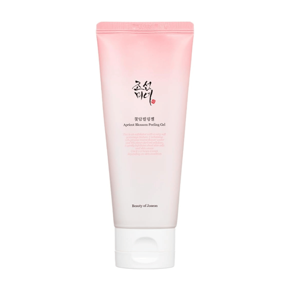 Un tube rose avec Apricot Blossom Peeling Gel de Beauty of Joseon sur un fond blanc.