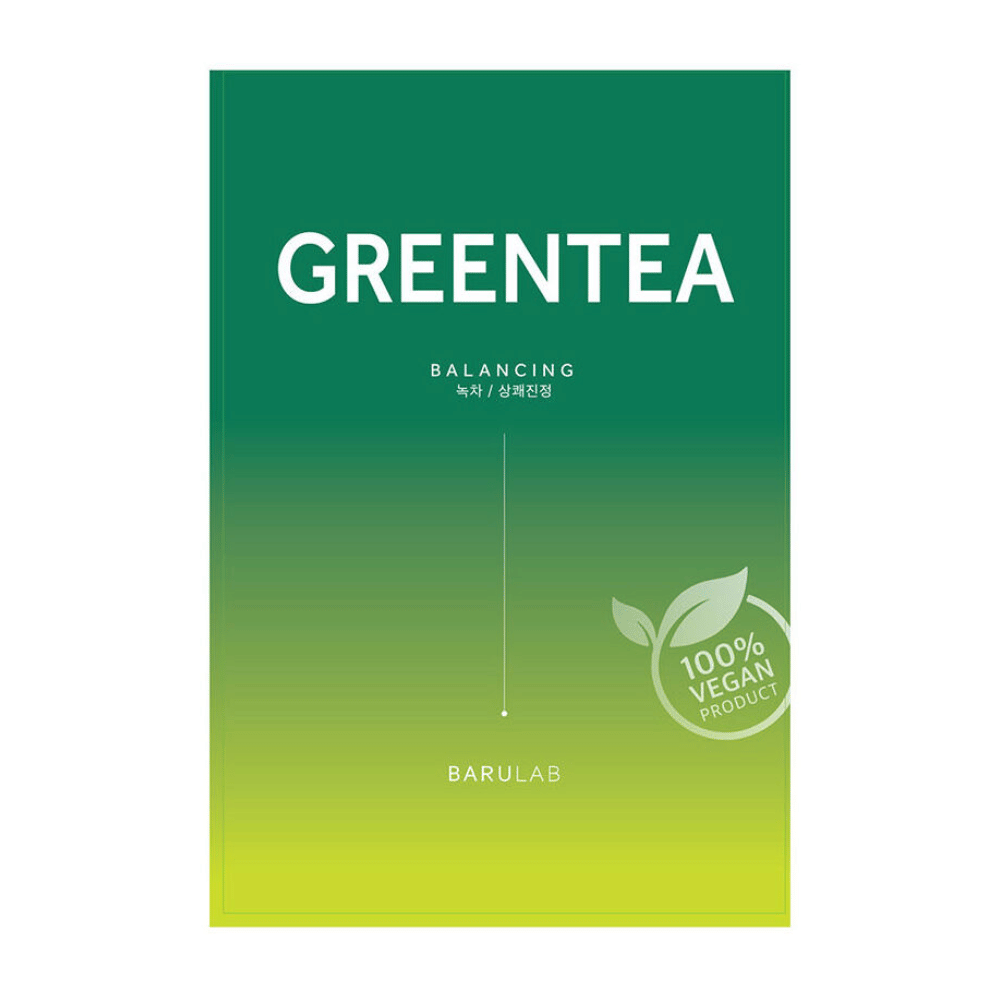 Un emballage de BARULAB masque "GREENTEA Balancing", marqué comme "100% Vegan Product". L'emballage a un dégradé de couleur du vert foncé au jaune clair.