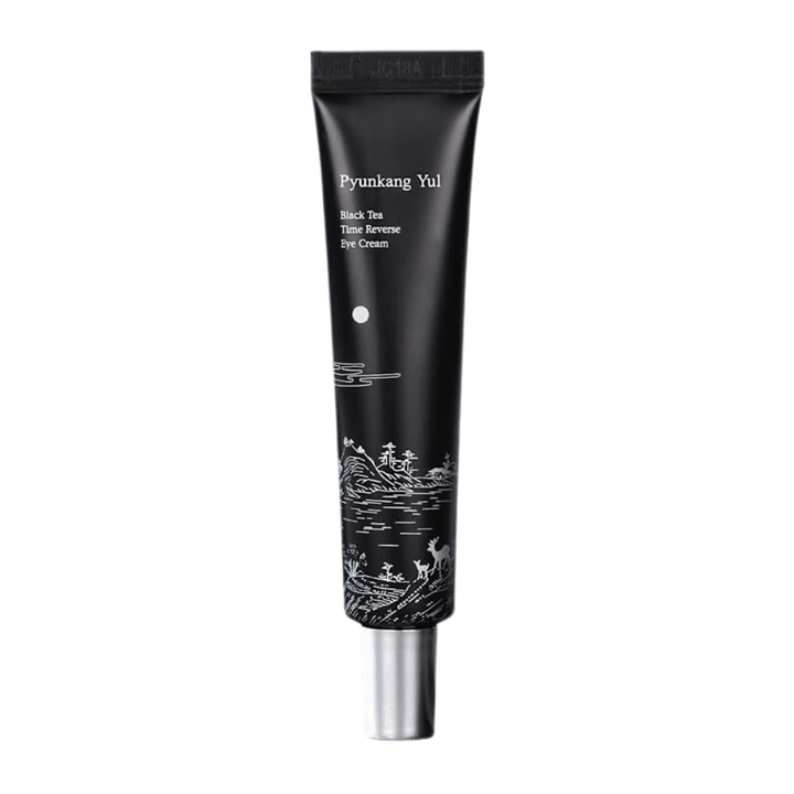 Pyunkang Yul Black Tea Time Reverse Eye Cream 25 ml en tube noire avec du thé noir fermenté, des peptides et des ingrédients hydratants pour le contour des yeux.