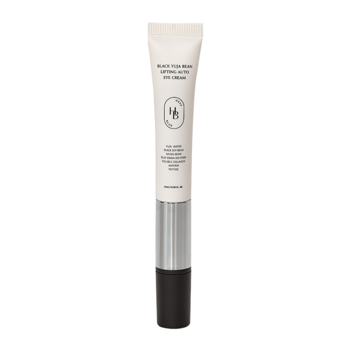 Image du produit HEVE BLUE Black Yuja Bean Lifting Auto Eye Cream – un tube avec un dessus blanc, un milieu argenté et un applicateur noir. Le texte sur l'emballage énumère des ingrédients comme l'eau de yuja et le haricot de soja noir.
