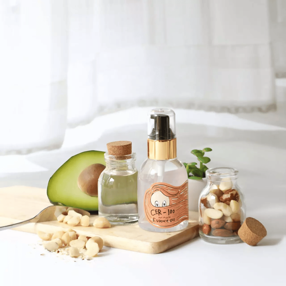 Elizavecca CER-100 Hair Muscle Essence Oil – huile capillaire coréenne avec avocat et huiles naturelles qui aide à hydrater, renforcer et donner de la brillance aux cheveux secs et abîmés.