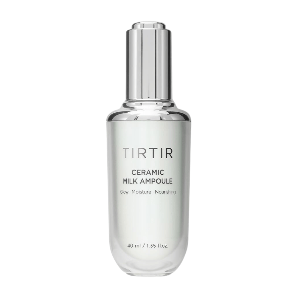  Une bouteille transparente TIRTIR Ceramic Milk Ampoule, marquée "Glow - Moisture - Nourishing", sur un fond blanc.