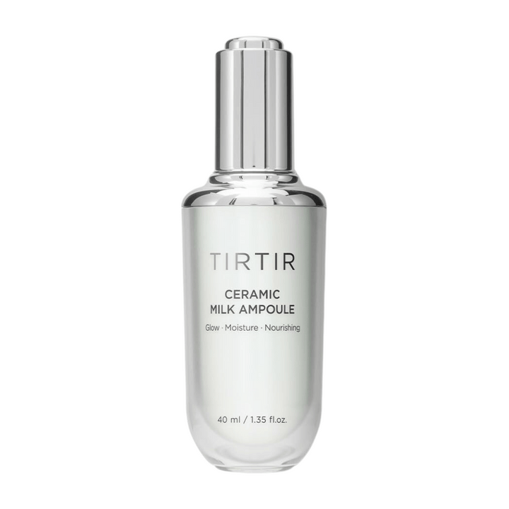  Une bouteille transparente TIRTIR Ceramic Milk Ampoule, marquée "Glow - Moisture - Nourishing", sur un fond blanc.