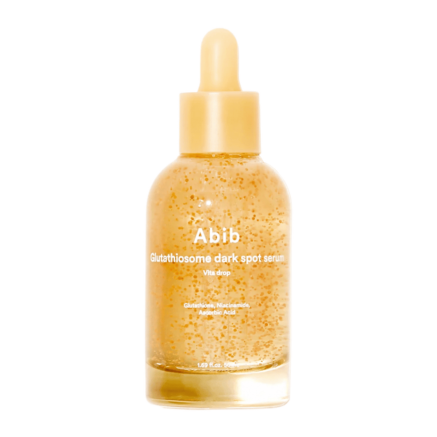 Image du produit de Abib Glutathiosome Dark Spot Serum Vita Drop dans une bouteille en verre transparent avec une pipette jaune et des microcapsules visibles dans le sérum.