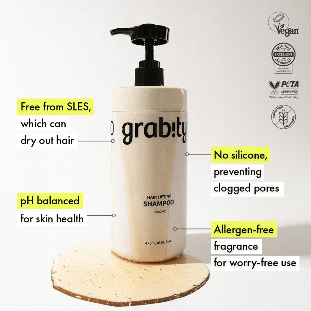 Grabity g0.0 Hair Lifting Shampoo Strong avec des informations sur une formule sans SLES, une composition sans silicone, un parfum sans allergènes et des certifications pour un soin capillaire végan et doux.