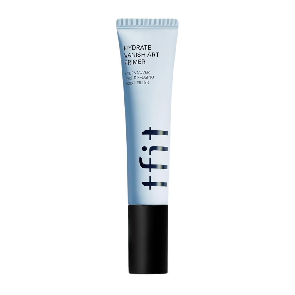 Tube bleue avec bouchon noir de TFIT, marqué "Hydrate Vanish Art Primer" – un primer hydratant avec effet lissant pour les pores et technologie de filtre hydratant.