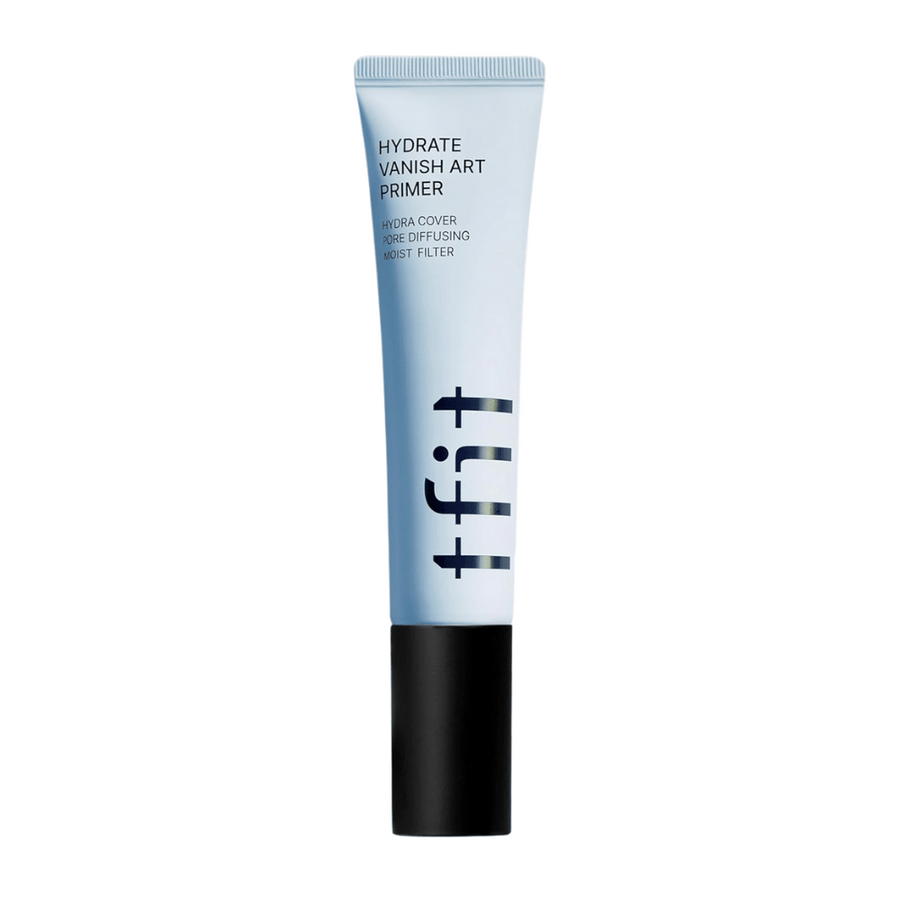 Tube bleue avec bouchon noir de TFIT, marqué "Hydrate Vanish Art Primer" – un primer hydratant avec effet lissant pour les pores et technologie de filtre hydratant.