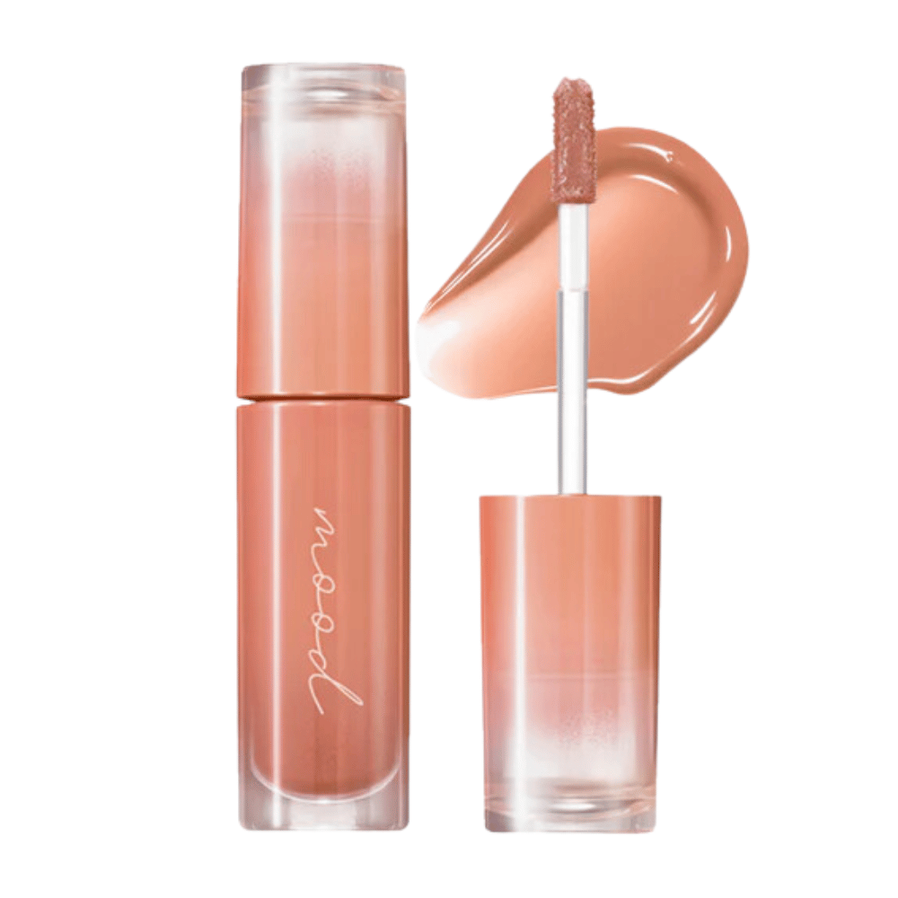 Ink Mood Glowy Tint est un brillant à lèvres avec une formule légère et brillante qui donne une couleur et une brillance naturelles aux lèvres. Parfait pour créer un look frais et éclatant. Disponible en plusieurs nuances.