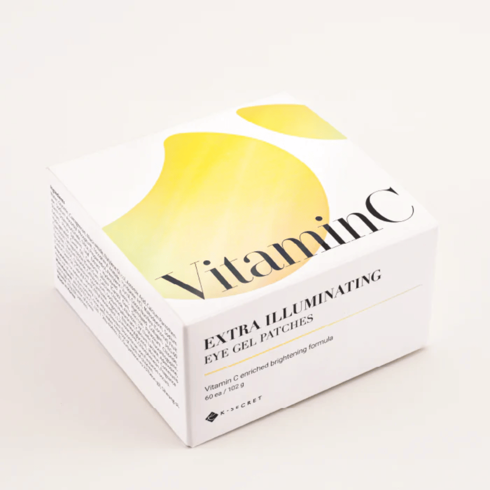 Emballage de K-Secret Extra Illuminating Eye Gel Patches avec vitamine C en design blanc et jaune.