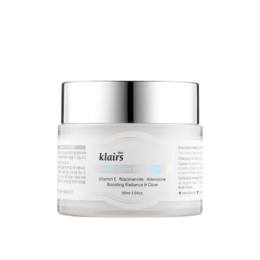 Pot fermé blanc de Klairs Freshly Juiced Vitamin E Mask avec texte sur la vitamine E, la niacinamide et l'adénosine pour l'éclat, sur fond blanc.