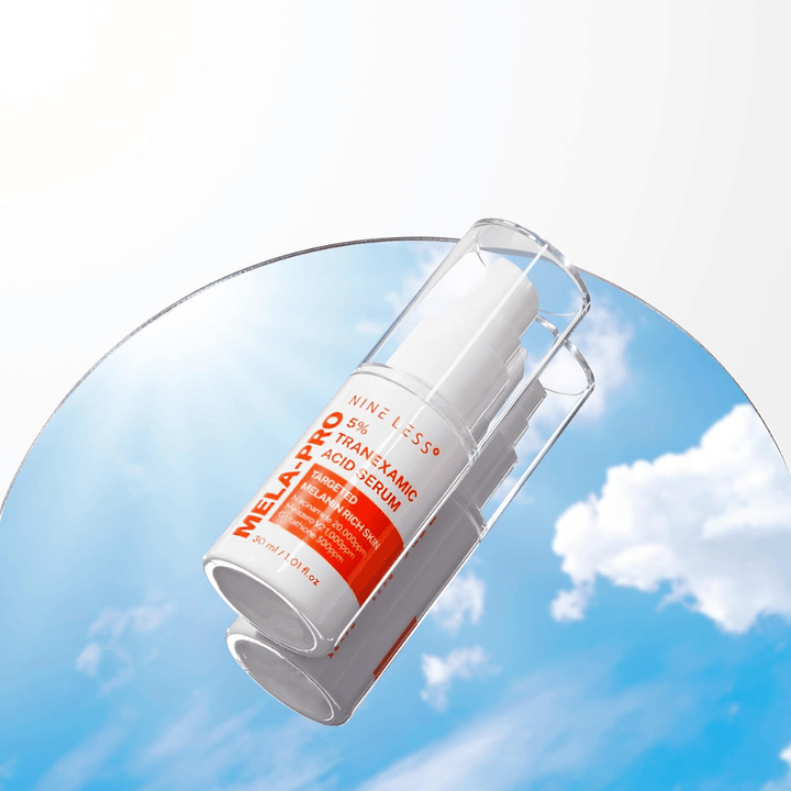 NINE LESS MELA-PRO 5% Tranexamic Acid Serum 30 ml avec pompe, sérum pour la pigmentation et les taches sombres.