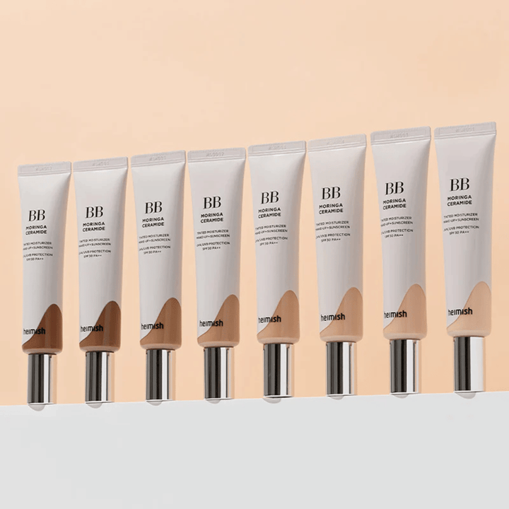 Rangée de Heimish Moringa Ceramide BB Cream dans plusieurs nuances de couleur. L’image illustre la variation des toner visage plus clairs aux plus foncés afin de convenir à différents tons de peau et besoins.
