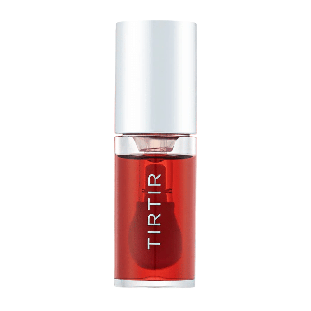 TIRTIR My Glow Lip Oil en teinte rouge translucide avec un couvercle argenté, présenté de face sur fond blanc.