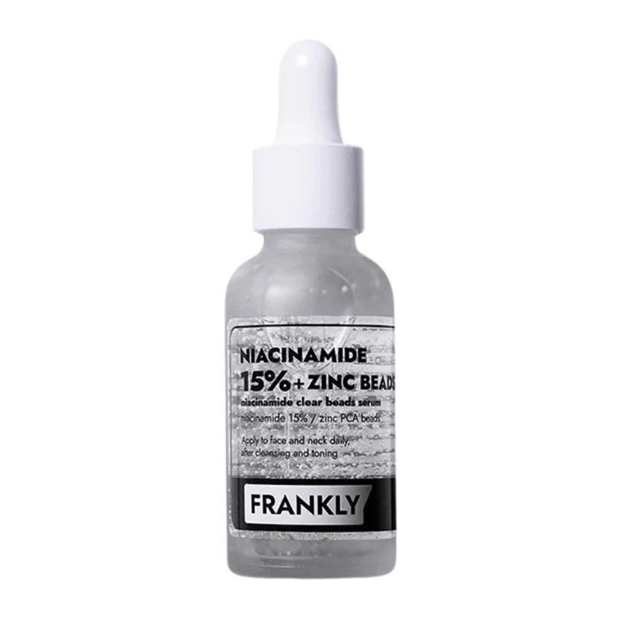 Image du produit FRANKLY Niacinamide 15% + Zinc Beads Serum dans une bouteille en verre avec pipette. Un sérum qui équilibre, apaise et améliore la clarté de la peau.