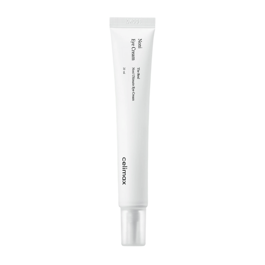 Noni Eye Cream dans un tube blanc avec un bouchon transparent. Le produit est de la marque Celimax et contient 20 ml. Le texte sur le tube indique qu'il s'agit d'une crème pour les yeux nourrissante.