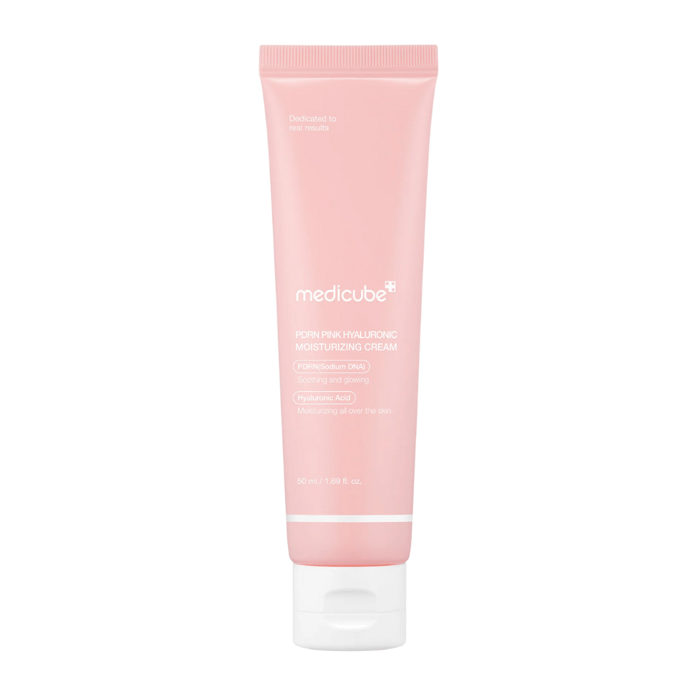 Medicube PDRN Pink Hyaluronic Moisturizing Cream dans un tube rose avec un bouchon blanc, une crème hydratante enrichie en acide hyaluronique et ADN de saumon PDRN.
