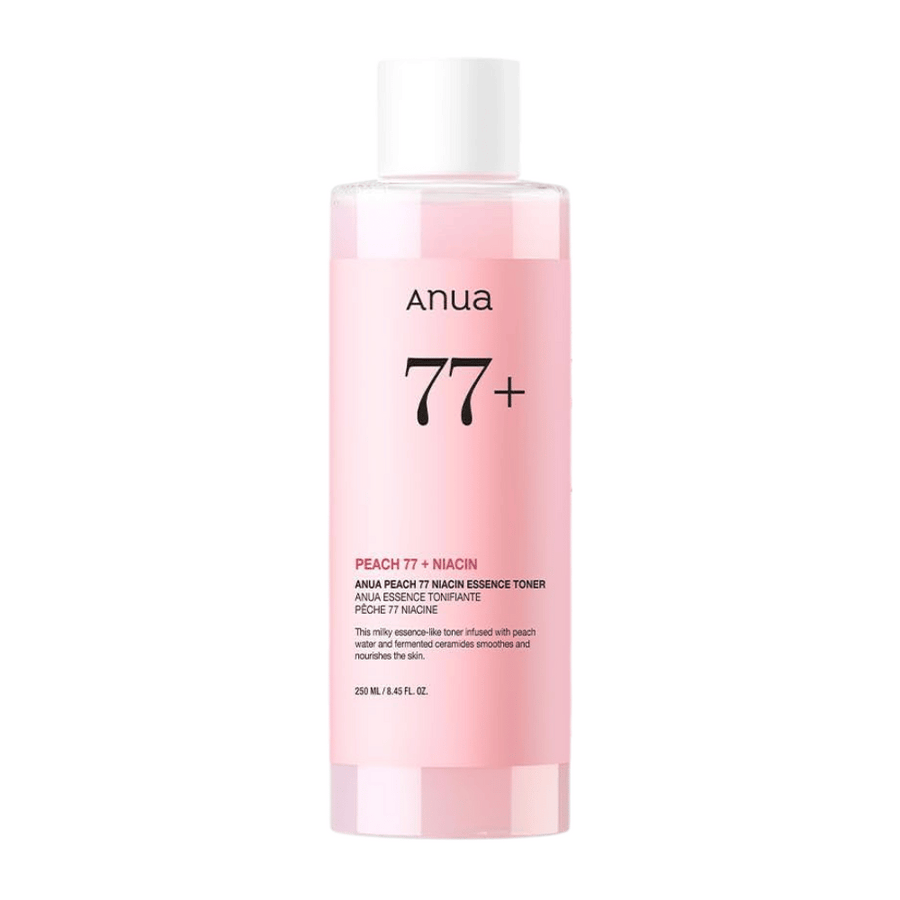 Anua Peach 77 Niacin Essence Toner dans une bouteille rose transparente avec un bouchon blanc, contenant 250 ml de toner lacté pour un teint plus uniforme et éclatant.