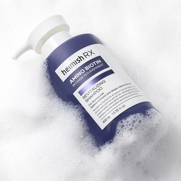 Heimish RX Amino Biotin Revitalizing Shampoo 400 ml en mousse – shampooing nourrissant pour cheveux secs qui nettoie en douceur et hydrate le cuir chevelu.