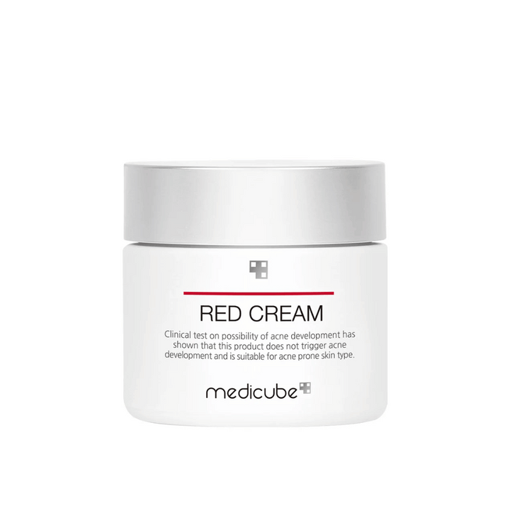 medicube Red Cream 50ml dans un pot blanc avec un couvercle argenté – conçu pour les peaux sujettes à l'acné et testé pour ne pas provoquer de nouvelles éruptions.
