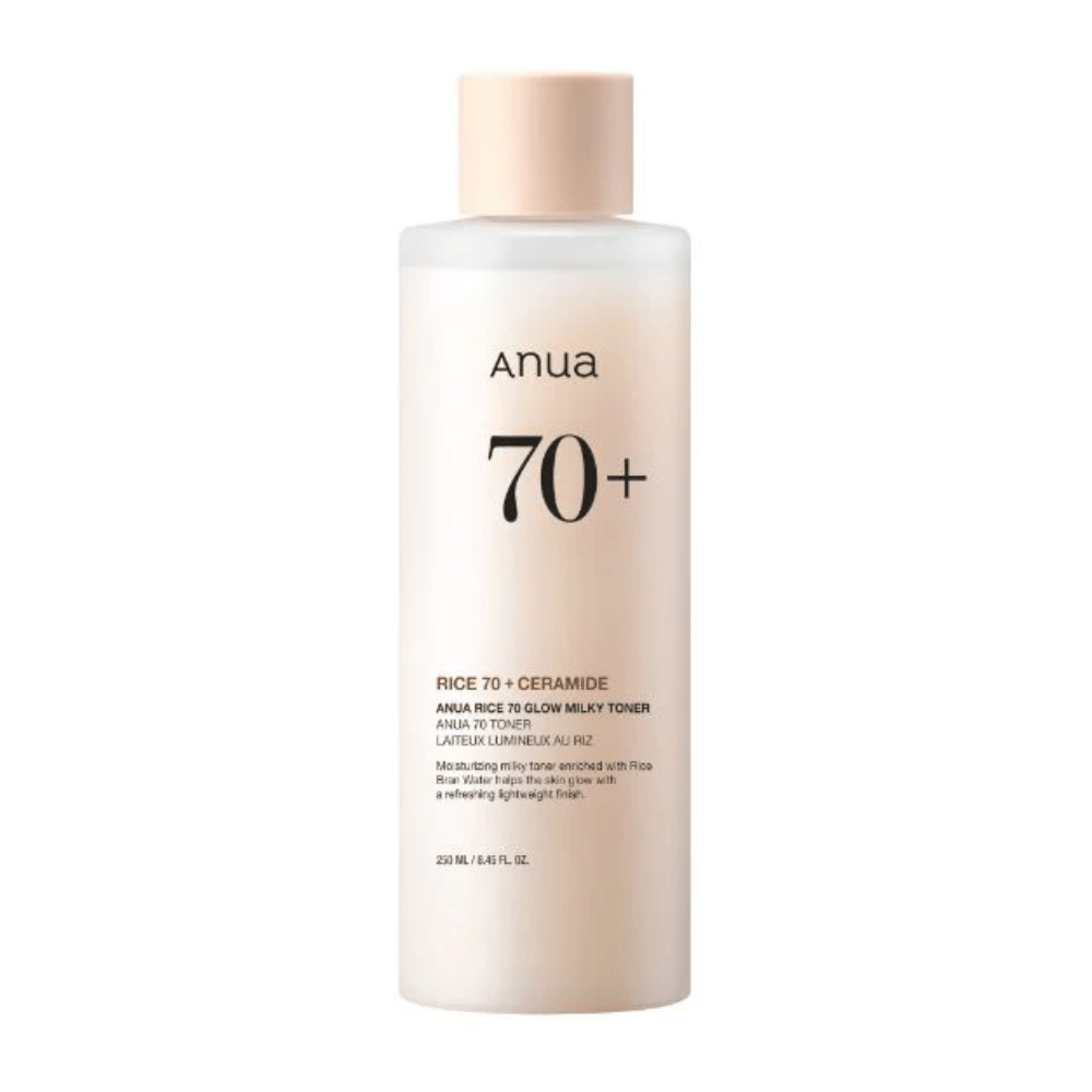 Une bouteille de "Anua 70+ Rice Ceramide Milky Toner". Ce toner est formulé pour éclaircir et donner de l'éclat à la peau, enrichi en eau de riz et céramides. L'emballage est simple et élégant avec une douce teinte beige et une étiquette discrète.