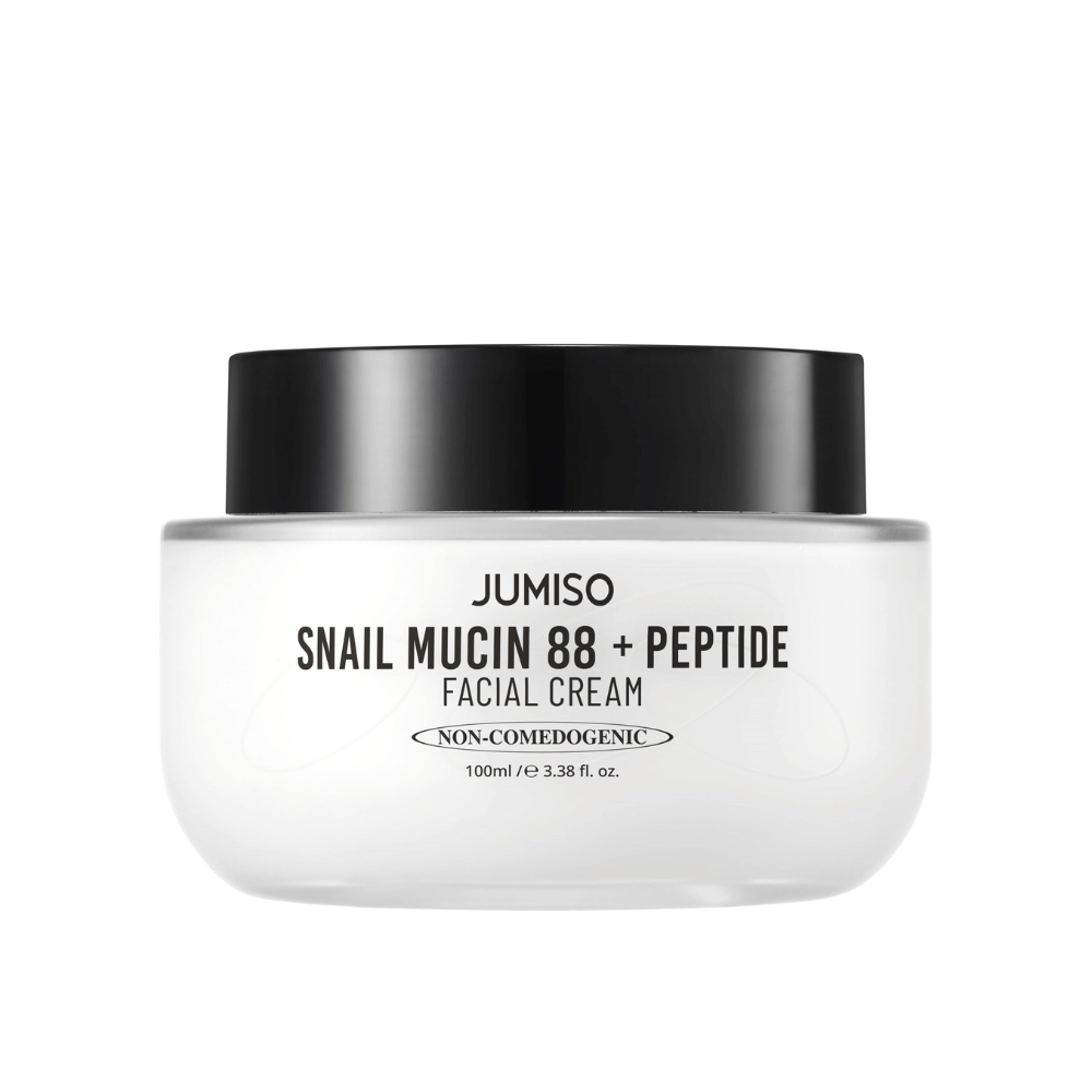 JUMISO Snail Mucin 88 + Peptide Facial Cream dans un pot blanc avec un couvercle noir. Crème pour le visage avec 88 % de sécrétion d'escargot et des peptides pour des soins intensifs de la peau et une hydratation.