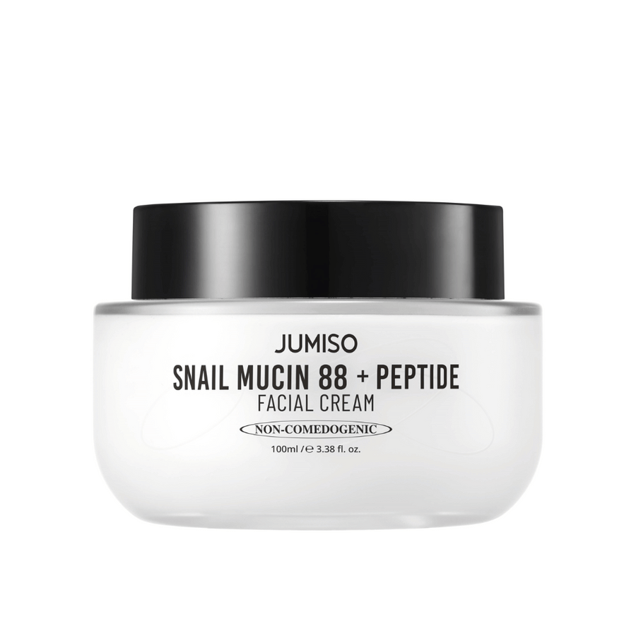 JUMISO Snail Mucin 88 + Peptide Facial Cream dans un pot blanc avec un couvercle noir. Crème pour le visage avec 88 % de sécrétion d'escargot et des peptides pour des soins intensifs de la peau et une hydratation.