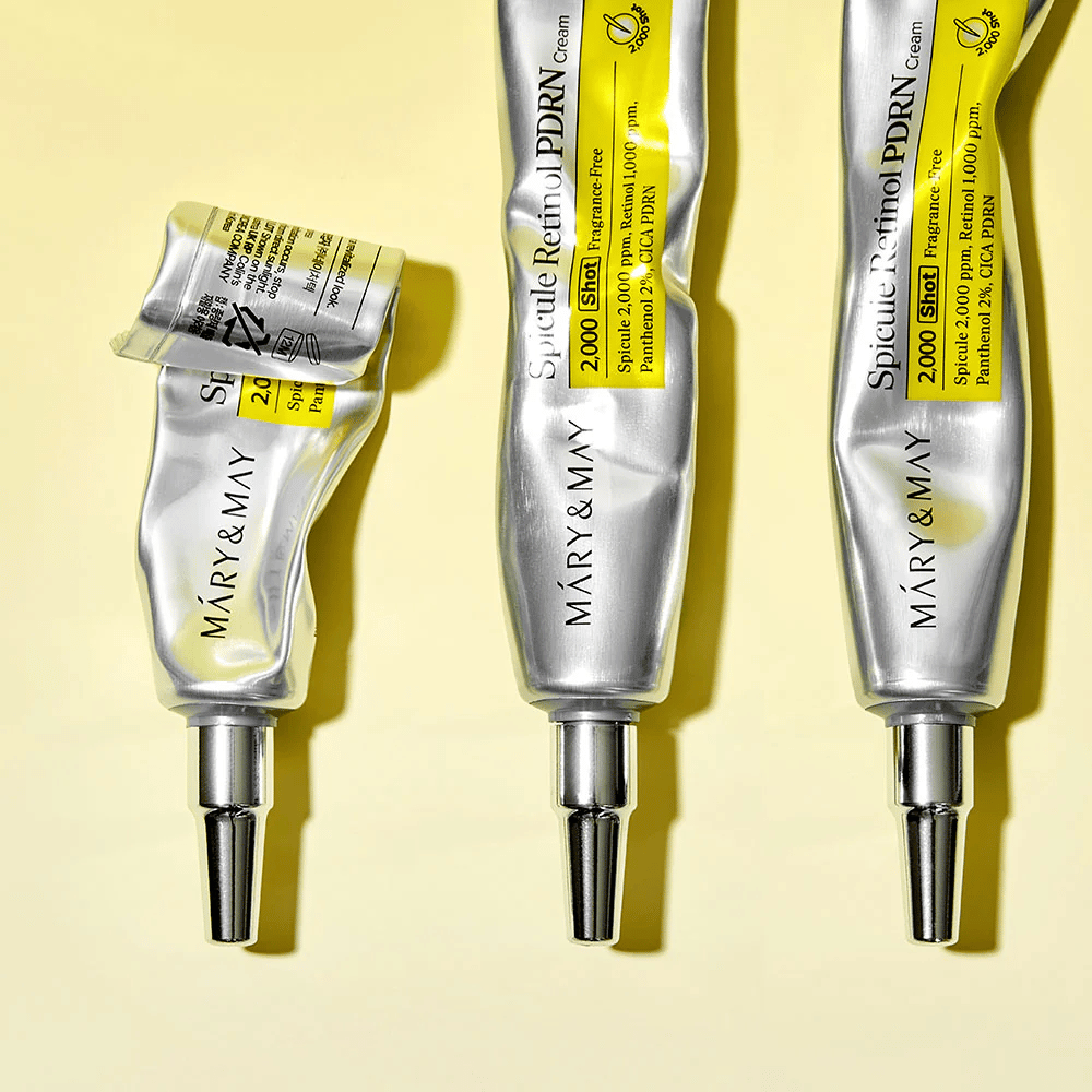 MARY & MAY Spicule Retinol PDRN Cream avec utilisation visible en tube, montre la consistance de la crème et un applicateur ciblé pour une application précise sur la peau.