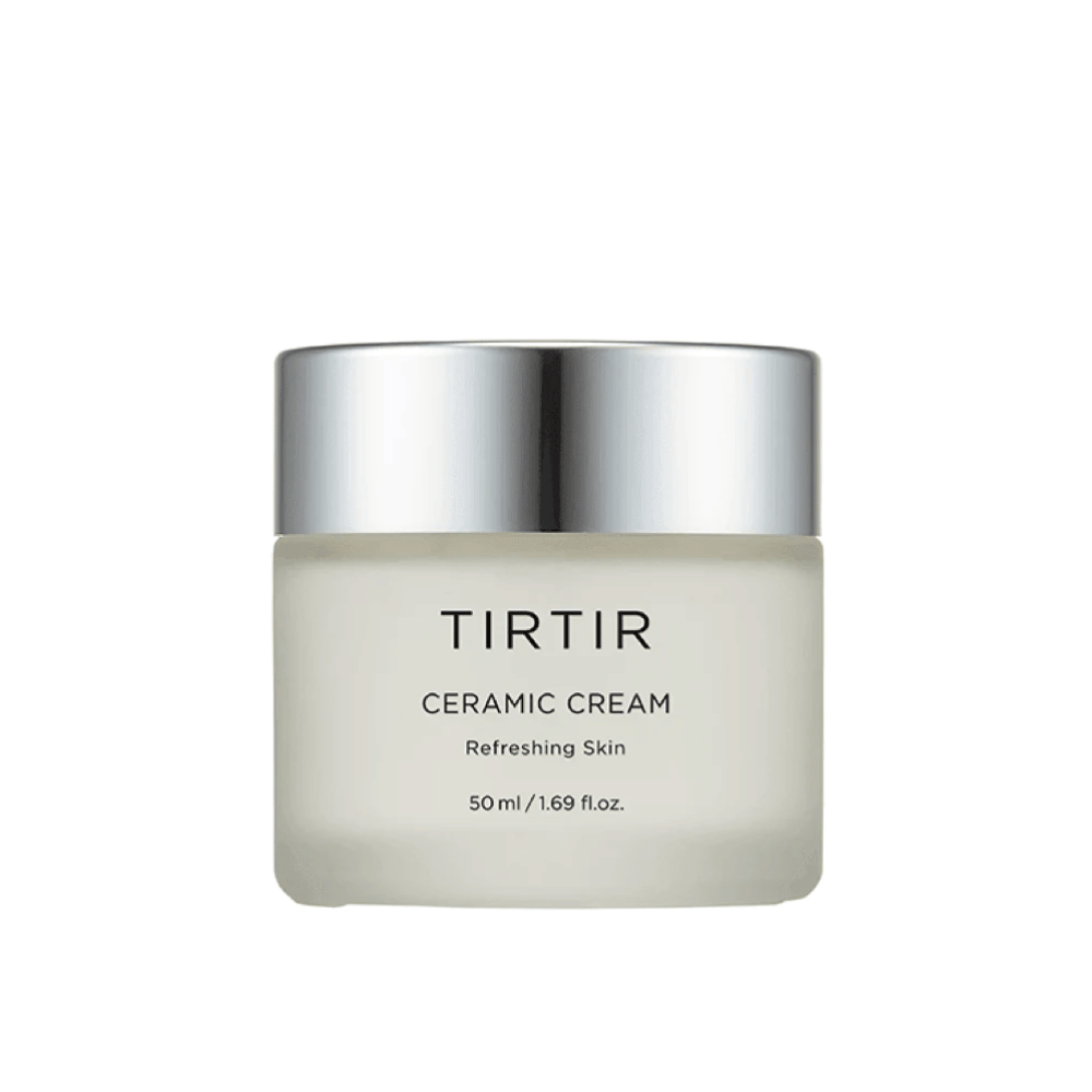 Un pot de TIRTIR Ceramic Cream destiné à "Refreshing Skin", avec un volume de 50 ml / 1.69 fl oz. Le pot a une couleur dégradée du blanc au transparent et un couvercle argenté.
