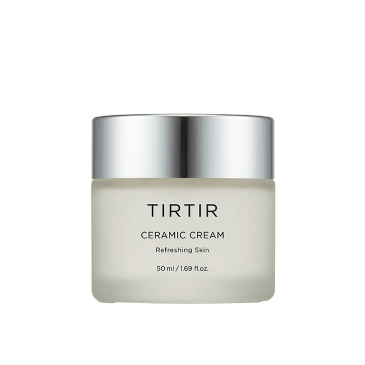 Un pot de TIRTIR Ceramic Cream destiné à "Refreshing Skin", avec un volume de 50 ml / 1.69 fl oz. Le pot a une couleur dégradée du blanc au transparent et un couvercle argenté.