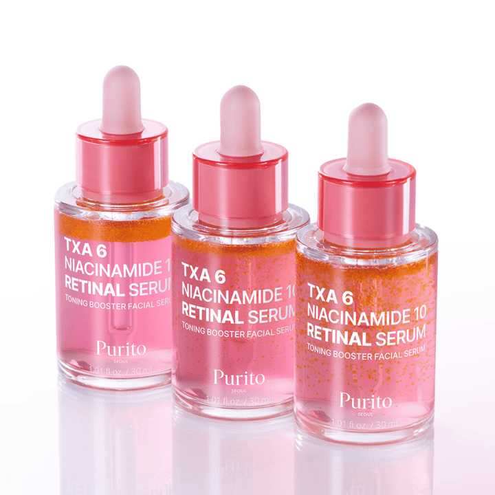 Trois flacons de Purito TXA 6 Niacinamide 10 Retinal Serum. Un sérum visage éclatant et uniformisant avec effet anti-âge.