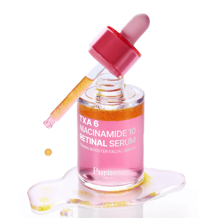 Purito TXA 6 Niacinamide 10 Retinal Serum – sérum booster tonifiant rose avec pipette. Combine TXA, niacinamide et rétinal pour un teint uniforme.