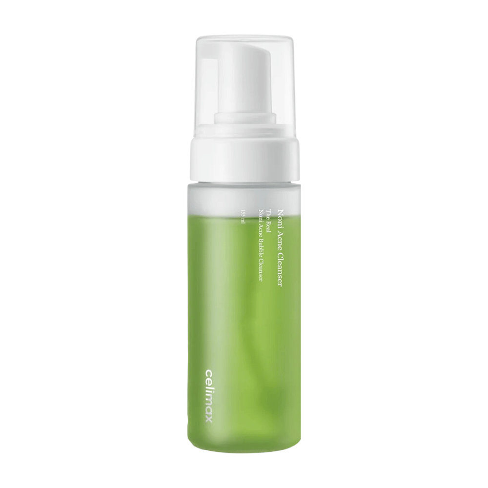 La bouteille avec The Real Noni Acne Bubble Cleanser montre un ton frais et vert, ce qui indique des ingrédients naturels. Le distributeur à pompe la rend conviviale et parfaite pour créer un nettoyant moussant riche. Idéal pour combattre l'acné et donner à la peau une sensation claire et propre.