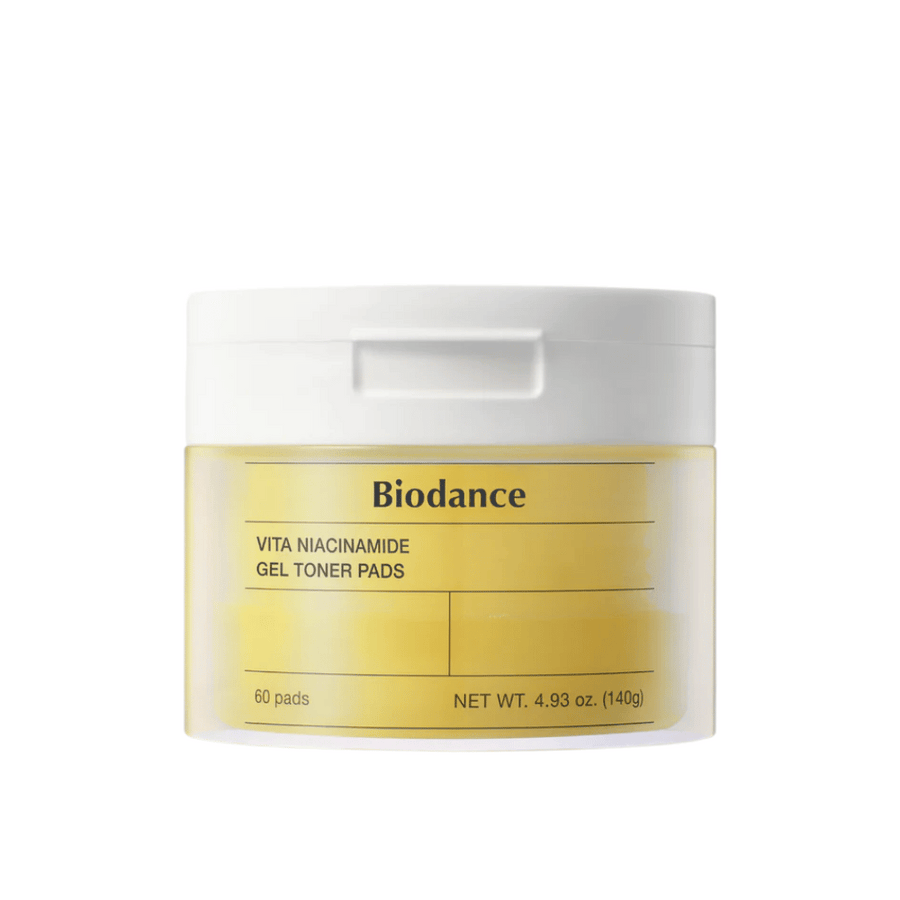 Biodance Vita Niacinamide Gel Toner Pads – emballage avec 60 tampons dans un pot jaune avec couvercle blanc, conçu pour uniformiser le teint et apporter de l'éclat.
