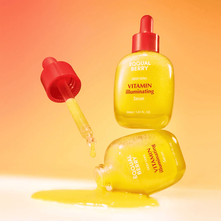Equal Berry Vitamin Illuminating Serum dans une bouteille jaune éclatante avec une pipette rouge. Texture liquide et arrière-plan énergique créent une sensation vivante et fraîche.