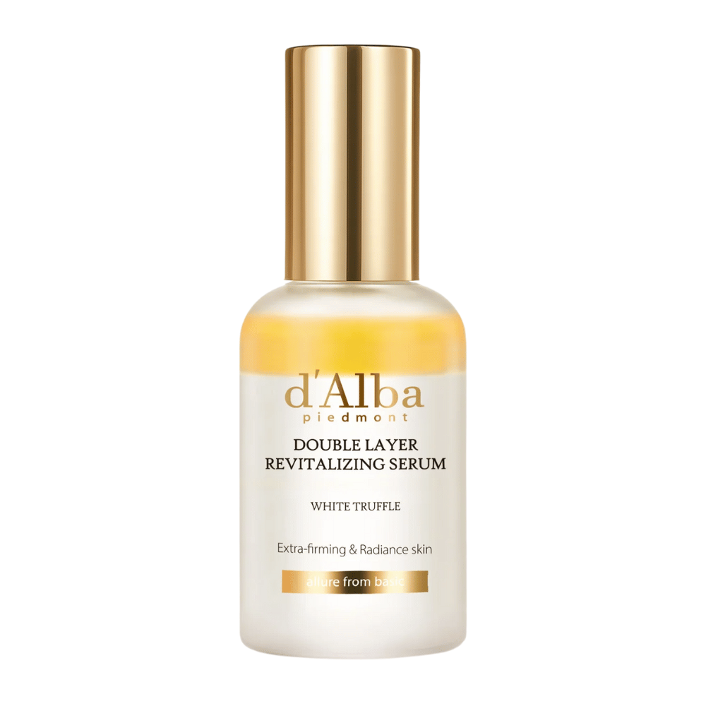 Image isolée de d'Alba Double Layer Revitalizing Serum White Truffle dans une bouteille en verre avec un dessus doré et un bouchon doré, sérum de soin pour la fermeté et l'éclat.