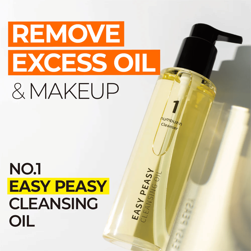 Bouteille de Numbuzin No.1 Easy Peasy Cleansing Oil sur fond blanc, le texte "Remove excess oil & makeup" est visible à côté.