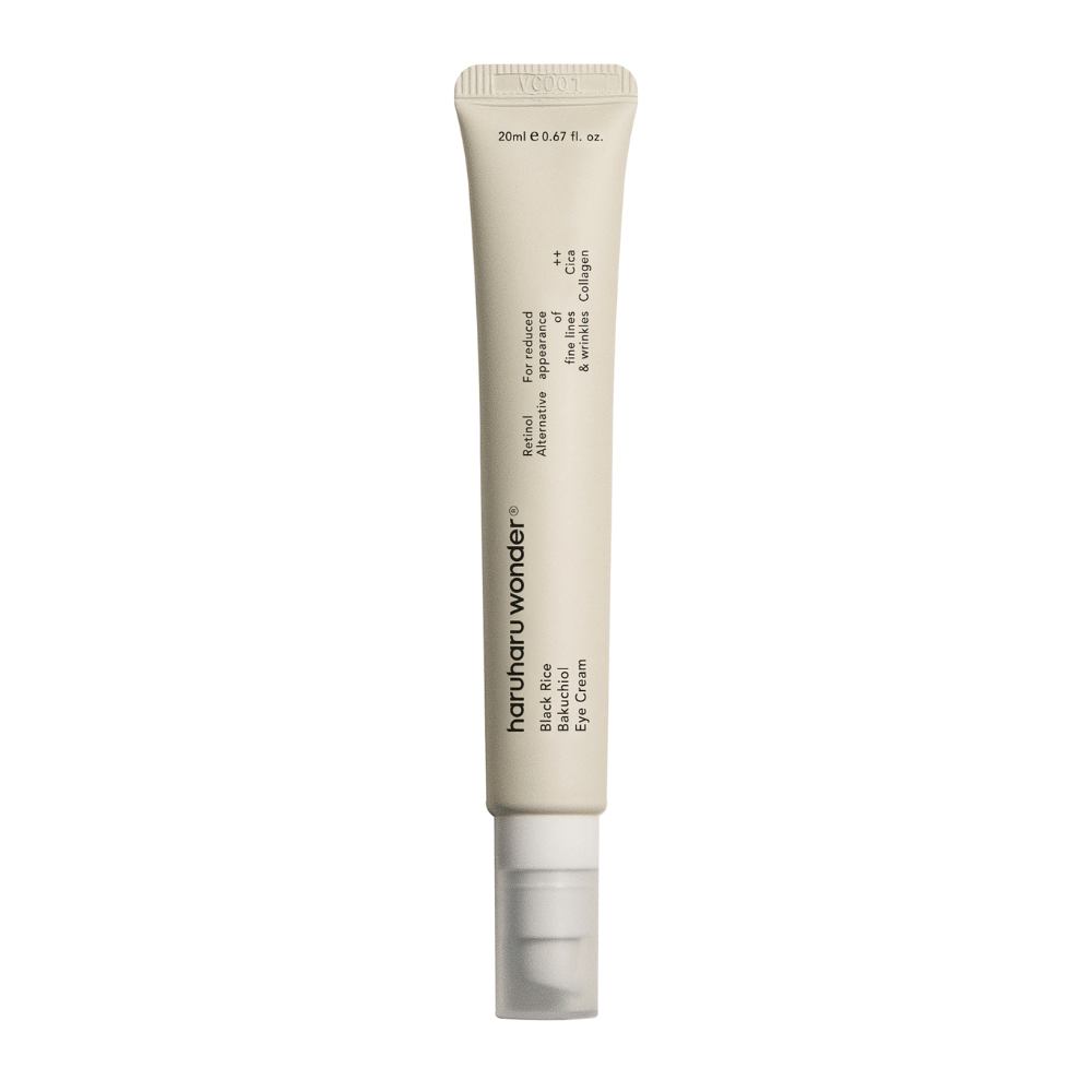 Un tube Haruharu Wonder Black Rice Bakuchiol Eye Cream 20ml sur fond blanc pour réduire la visibilité des ridules et des rides.